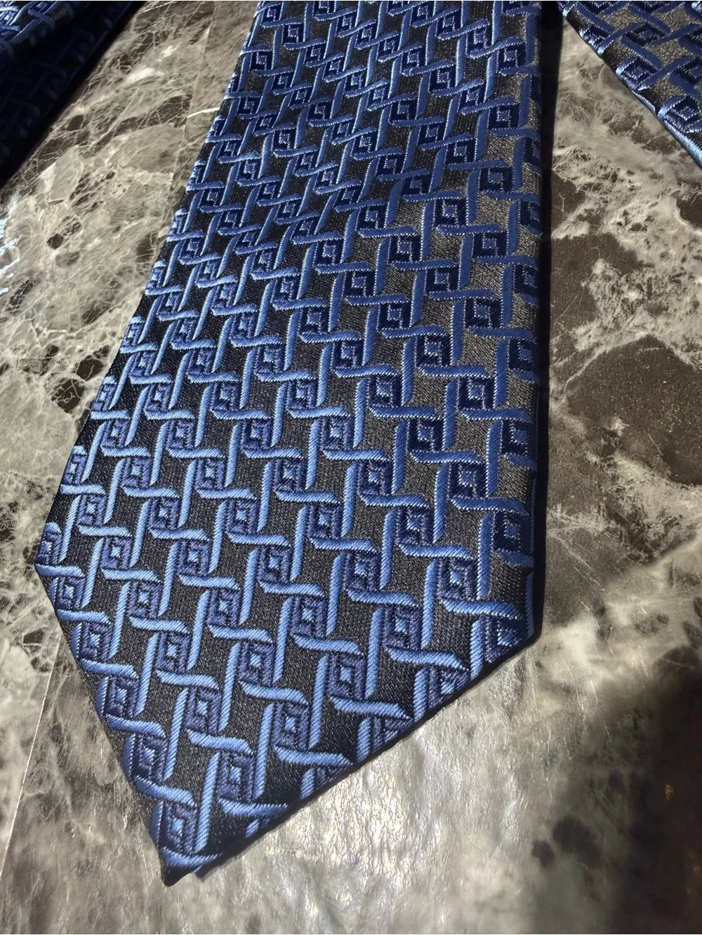 Men’s WeiShang tie in purple/blue/black geometric print